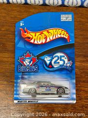 MaxSold Auction: Hot Wheels Toronto Blue Jays 25th Season Diecast Car – Sealed Carded Promo - Hamilton (Ontario, Canada) SELLER MANAGED Estate Sale Online Auction - Gertrude Street