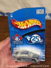 MaxSold Auction: Hot Wheels Toronto Blue Jays 25th Season Diecast Car – Sealed Carded Promo - Hamilton (Ontario, Canada) SELLER MANAGED Estate Sale Online Auction - Gertrude Street