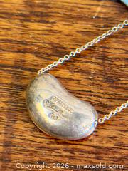 MaxSold Auction: TIFFANY & Co. - Elsa Peretti 'Bean' Pendant Necklace - Sterling Silver - Hamilton (Ontario, Canada) SELLER MANAGED Estate Sale Online Auction - Gertrude Street