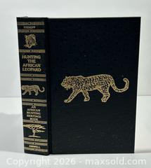 MaxSold Auction: 1995 Hunting The African Leopard Numbered 92/1000 Book with Slipcase by Jim Rikhoff - Burlington (Ontario, Canada) SELLER MANAGED Estate Sale Online Auction - Fairview Street (STORAGE)