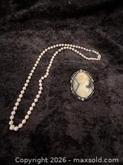 MaxSold Auction: Jewelry - Cameo Pin and Pearl Necklace - Webster (New York, USA) PARTNER MANAGED Estate Sale Online Auction - Hidden Valley Trail