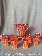 MaxSold Auction: Indiana Glass Sunset/Amberina Heirloom Carnival Glass Pitcher with Eight Tumblers - Bremerton (Washington, USA) SELLER MANAGED Estate Sale Online Auction - Burwell Street