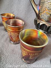 MaxSold Auction: Northwood Amethyst Grape and Cable Carnival Glass Pitcher with Six Tumblers - Bremerton (Washington, USA) SELLER MANAGED Estate Sale Online Auction - Burwell Street