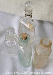 MaxSold Auction: Antique Four (4)Glass Bottle Collection: Clear + light Green Bottles Lot - Ottawa (Ontario, Canada) SELLER MANAGED Downsizing Online Auction -  Woodpark Way