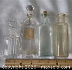 MaxSold Auction: Antique Four (4)Glass Bottle Collection: Clear + light Green Bottles Lot - Ottawa (Ontario, Canada) SELLER MANAGED Downsizing Online Auction -  Woodpark Way