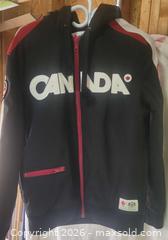 MaxSold Auction: Canada Olympic Hudson’s Bay Men’s Hoodie Black 2010 Podium Jacket sz Medium - Ottawa (Ontario, Canada) SELLER MANAGED Downsizing Online Auction -  Woodpark Way