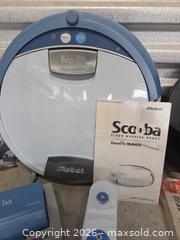 MaxSold Auction: iRobot Scooba, Dirt Devil Hand Vac & Rowenta Steamer Lot - Cypress(Texas, USA) PARTNER MANAGED Downsizing Online Auction - Woodworth Drive