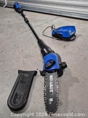 MaxSold Auction: Kobalt 40V Pole Saw / Pole Pruner with 40V 2.5Ah Battery - Cypress(Texas, USA) PARTNER MANAGED Downsizing Online Auction - Woodworth Drive