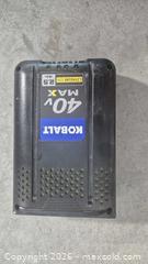 MaxSold Auction: Kobalt 40V Pole Saw / Pole Pruner with 40V 2.5Ah Battery - Cypress(Texas, USA) PARTNER MANAGED Downsizing Online Auction - Woodworth Drive