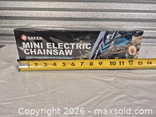MaxSold Auction: Saker 4in Cordless Mini Electric Chainsaw Blue - Cypress(Texas, USA) PARTNER MANAGED Downsizing Online Auction - Woodworth Drive