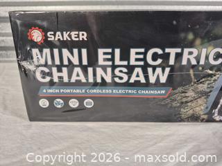 MaxSold Auction: Saker 4in Cordless Mini Electric Chainsaw Blue - Cypress(Texas, USA) PARTNER MANAGED Downsizing Online Auction - Woodworth Drive