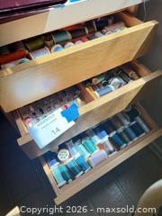 MaxSold Auction: Assorted Sewing Thread & Spool Holder  - Los Angeles (California, USA) PARTNER MANAGED Downsizing Online Auction - Sapphire Drive