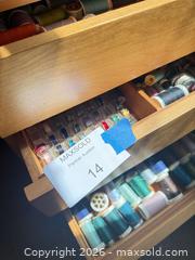 MaxSold Auction: Assorted Sewing Thread & Spool Holder  - Los Angeles (California, USA) PARTNER MANAGED Downsizing Online Auction - Sapphire Drive