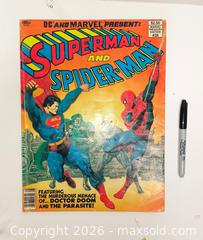 MaxSold Auction: LARGE 1981 Marvel/DC "Superman & Spiderman" Treasury comic - Ottawa (Ontario, Canada) SELLER MANAGED Downsizing Online Auction - Farmington Avenue