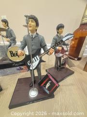 MaxSold Auction: The Beatles Licensed 4-Figure Collectible Set with Instruments - Vaughan (Ontario, Canada) SELLER MANAGED Downsizing Online Auction - Faye Court