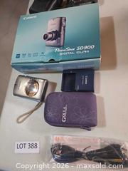 MaxSold Auction: Two Canon digital cameras with cases, boxes and instructions  - Janetville (Ontario, Canada) SELLER MANAGED Charity/Fundraising Online Auction - Janetville Road