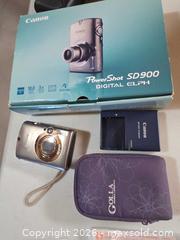 MaxSold Auction: Two Canon digital cameras with cases, boxes and instructions  - Janetville (Ontario, Canada) SELLER MANAGED Charity/Fundraising Online Auction - Janetville Road