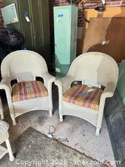 MaxSold Auction: Resin Wicker Outdoor Armchair with Striped Cushion A - Catasauqua (Pennsylvania, USA) Estate Sale Online Auction - American Street