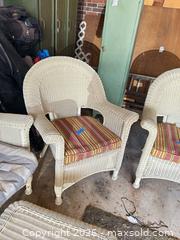 MaxSold Auction: Resin Wicker Outdoor Armchair with Striped Cushion A - Catasauqua (Pennsylvania, USA) Estate Sale Online Auction - American Street