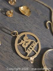 MaxSold Auction: 14K Yellow Gold SCRAP Jewelry Lot: Rings, Necklace, Pendants, Earrings - Los Angeles (California, USA) PARTNER MANAGED Moving Online Auction - W 36th Street (CONDO)