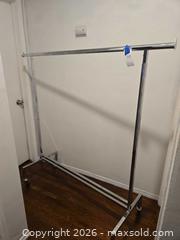 MaxSold Auction: Adjustable Chrome Metal Garment Rack with wheels, 60 in wide - Los Angeles (California, USA) PARTNER MANAGED Moving Online Auction - W 36th Street (CONDO)