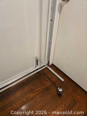 MaxSold Auction: Adjustable Chrome Metal Garment Rack with wheels, 60 in wide - Los Angeles (California, USA) PARTNER MANAGED Moving Online Auction - W 36th Street (CONDO)