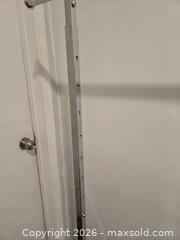 MaxSold Auction: Adjustable Chrome Metal Garment Rack with wheels, 60 in wide - Los Angeles (California, USA) PARTNER MANAGED Moving Online Auction - W 36th Street (CONDO)