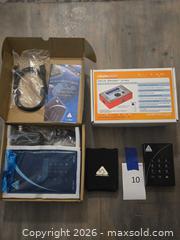 MaxSold Auction: Apricorn Padlock for Data Secruity & Drive Erazer Ultra - Los Angeles (California, USA) PARTNER MANAGED Moving Online Auction - W 36th Street (CONDO)