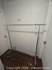 MaxSold Auction: Chrome Steel Adjustable Garment Rack with Casters, 60 in wide - Los Angeles (California, USA) PARTNER MANAGED Moving Online Auction - W 36th Street (CONDO)