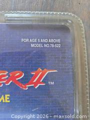 MaxSold Auction: Dream Cast Controllers, Device and Street Fighter II LCD Video Game Capcom  - Los Angeles (California, USA) PARTNER MANAGED Moving Online Auction - W 36th Street (CONDO)