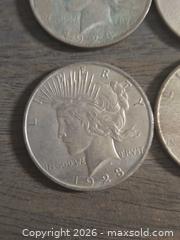 MaxSold Auction: Lot of 11 US Peace Silver Dollars (Philadelphia, 1923) - Los Angeles (California, USA) PARTNER MANAGED Moving Online Auction - W 36th Street (CONDO)