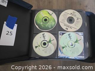 MaxSold Auction: Lots of Rock and Classic Rock CDs Beatles, No Doubt, Led Zeppelin, Johnny Cash and more! - Los Angeles (California, USA) PARTNER MANAGED Moving Online Auction - W 36th Street (CONDO)