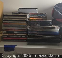 MaxSold Auction: Lots of Rock and Metal CDs  - Los Angeles (California, USA) PARTNER MANAGED Moving Online Auction - W 36th Street (CONDO)