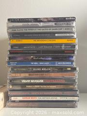 MaxSold Auction: Lots of Rock and Metal CDs  - Los Angeles (California, USA) PARTNER MANAGED Moving Online Auction - W 36th Street (CONDO)