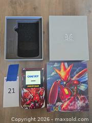 MaxSold Auction: Pokemon BackLit GameBoy Color with Custom box and Shell - Los Angeles (California, USA) PARTNER MANAGED Moving Online Auction - W 36th Street (CONDO)