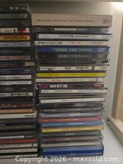 MaxSold Auction: Rock CDs Lot  - Los Angeles (California, USA) PARTNER MANAGED Moving Online Auction - W 36th Street (CONDO)