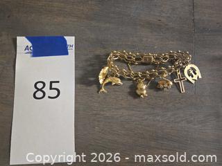 MaxSold Auction: Yellow Gold 14KT Charm Bracelet with Charms - Los Angeles (California, USA) PARTNER MANAGED Moving Online Auction - W 36th Street (CONDO)