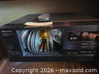 MaxSold Auction: Pioneer 100 CD player & 4 racks of CDs .  - Glendale (California, USA) SELLER MANAGED Estate Sale Online Auction -  Rancho Avenue