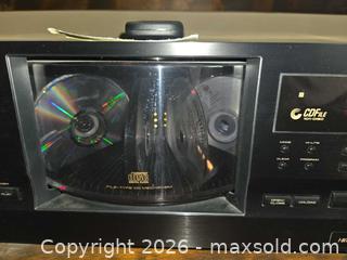 MaxSold Auction: Pioneer 100 CD player & 4 racks of CDs .  - Glendale (California, USA) SELLER MANAGED Estate Sale Online Auction -  Rancho Avenue