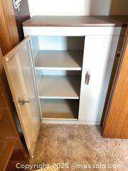 MaxSold Auction: Small Beige Metal Storage Cabinet with Wood Veneer Top - Denver (Colorado, USA) PARTNER MANAGED Estate Sale Online Auction - Fenton Street
