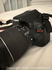 MaxSold Auction: Canon Rebel digital camera and small Canon sure shot zoom camera.  - Toronto (Ontario, Canada) SELLER MANAGED Downsizing Online Auction - Davenport Road (CONDO)