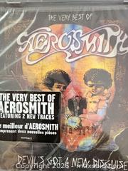MaxSold Auction: Lot of 3 Rock CDs: Aerosmith & Scorpions Never opened - Toronto (Ontario, Canada) SELLER MANAGED Downsizing Online Auction - Davenport Road (CONDO)