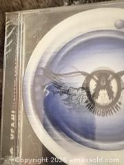 MaxSold Auction: Lot of 3 Rock CDs: Aerosmith & Scorpions Never opened - Toronto (Ontario, Canada) SELLER MANAGED Downsizing Online Auction - Davenport Road (CONDO)