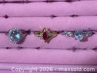 MaxSold Auction: Lot of 3 Mixed Metal Rings with Blue, Red and White Topaz - Buford (Georgia, USA) SELLER MANAGED Downsizing Online Auction - Commerce Drive (STORAGE)