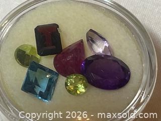 MaxSold Auction: Lot of 7 Loose and Cut Colored Gemstones - Buford (Georgia, USA) SELLER MANAGED Downsizing Online Auction - Commerce Drive (STORAGE)