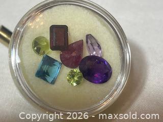 MaxSold Auction: Lot of 7 Loose and Cut Colored Gemstones - Buford (Georgia, USA) SELLER MANAGED Downsizing Online Auction - Commerce Drive (STORAGE)