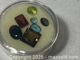 MaxSold Auction: Lot of 7 Mixed-Colored Loose and Cut Gemstones (5–15 mm) - Buford (Georgia, USA) SELLER MANAGED Downsizing Online Auction - Commerce Drive (STORAGE)