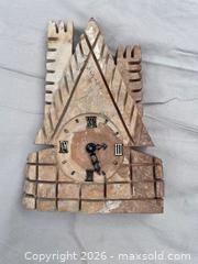 MaxSold Auction: Pair Brass Wall Sconces, Tripod Holder, Carved Stone Clock & Figurine - Buford (Georgia, USA) SELLER MANAGED Downsizing Online Auction - Commerce Drive (STORAGE)