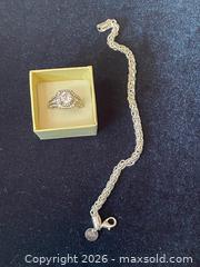 MaxSold Auction: Sterling Silver Halo CZ Ring and Rope/Byzantine Chain Bracelet - Buford (Georgia, USA) SELLER MANAGED Downsizing Online Auction - Commerce Drive (STORAGE)