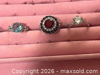 MaxSold Auction: Sterling Silver Trio: Blue Topaz, Garnet/Ruby, White Topaz - Buford (Georgia, USA) SELLER MANAGED Downsizing Online Auction - Commerce Drive (STORAGE)